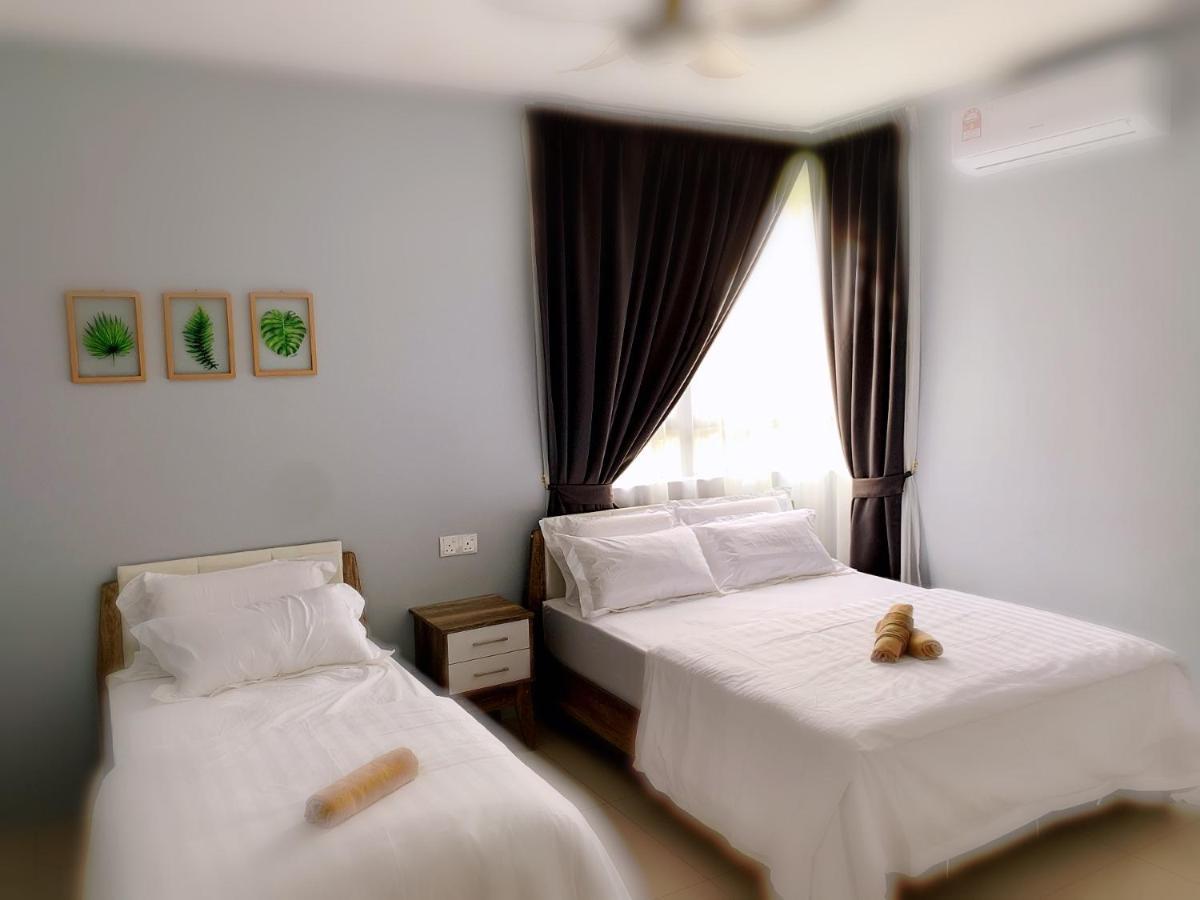 Aries Homestay Ipoh Bagian luar foto